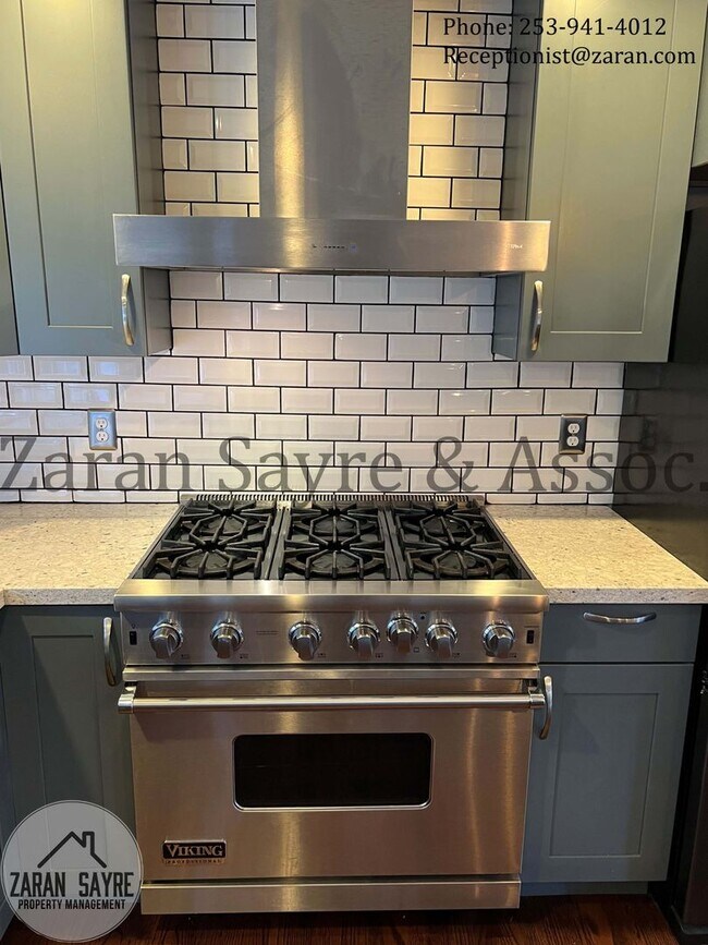 Building Photo - 414 - Your Dream Kitchen Awaits!
