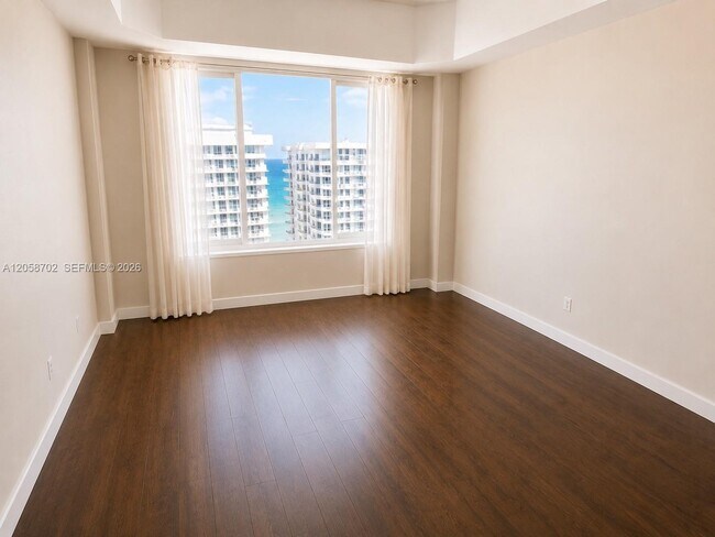 Building Photo - 5600 Collins Ave