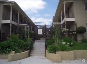 Building Photo - AFFORDABLE 1st Floor Condo & patio yard!