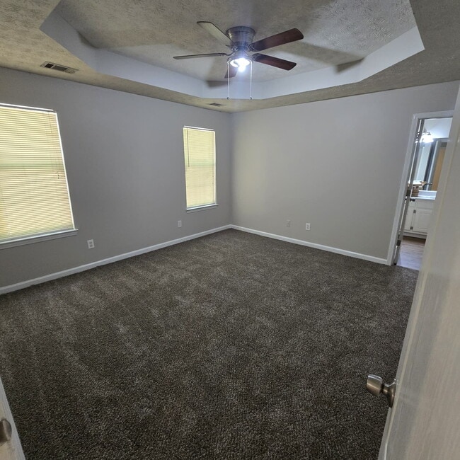 Building Photo - "Charming 4-Bed Oasis with Granite Countertops on Pebble Creek Drive, McDonough!"