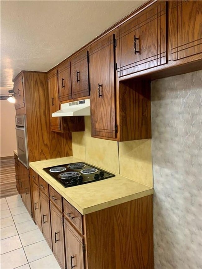 Building Photo - Charming Home with Open Kitchen, Fireplace & 2-Car Garage