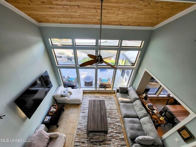 Building Photo - Riverfront Living with Private Boat Launch