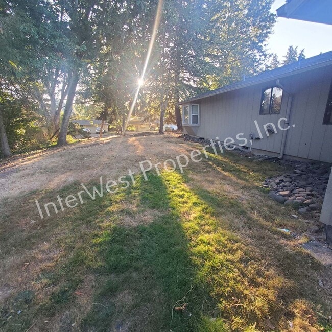 Building Photo - Beautiful Ranch Style Home on Very Large Corner Lot With W/D Hookups, Fireplace, 2 Car Garage & A...