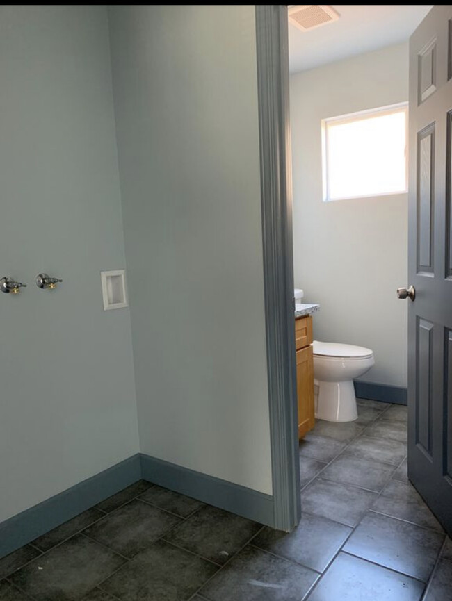 Downstairs Toilet, separate laundry/washer h/u - 8651 Santa Paula Way