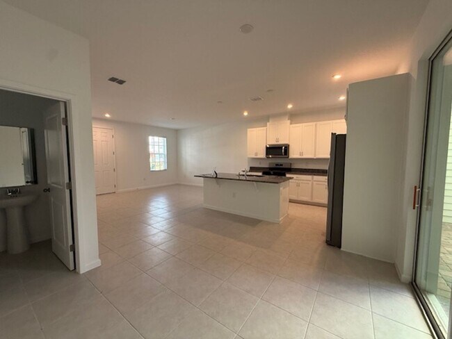 Building Photo - Brand new construction 3 Bedroom Town Home in Island Village of Celebration