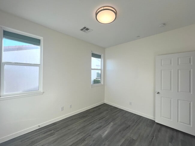 Building Photo - Single-story 1326 sq ft, townhome built in 2019 w/3 bed, 2 bath & spacious attached 2-car garage ...