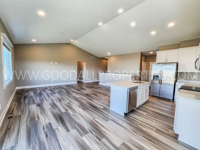 Building Photo - Spacious Waukee Ranch | 4 Bedrooms | 3-Car Garage | Finished Basement