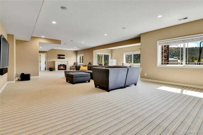 Building Photo - Spacious Colorado Luxury Home with 3-Car Garage, Outdoor Living & Scenic Wildlife