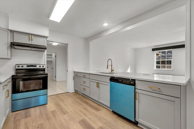 Building Photo - 4BR/3BA Updated Home – Quiet Cove + Fenced Yard!