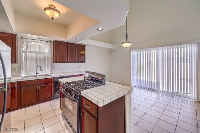 Building Photo - 8736 Raindrop Canyon Ave