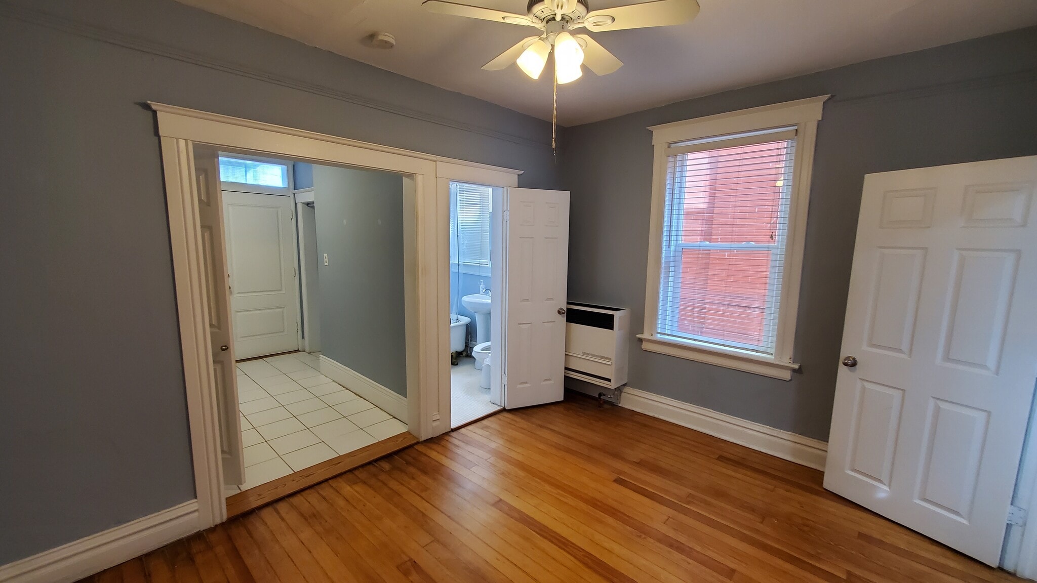 Large bedroom with Fan - 210 S Logan St