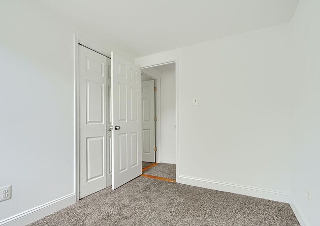 Building Photo - Updated End-of-Group Townhome with Finished Lower Level, Fenced Yard & Community Pool