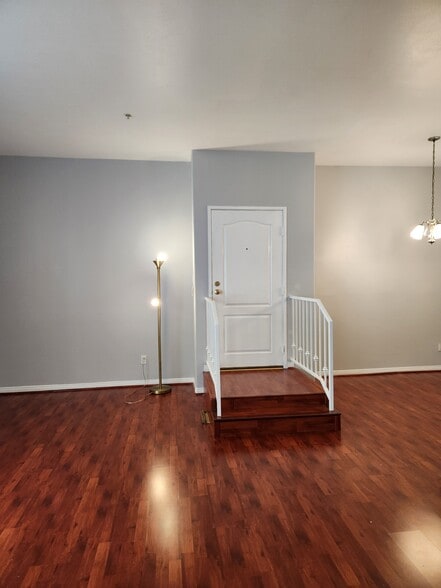 Stairs separating living and dining space - 7037 La Tijera Blvd