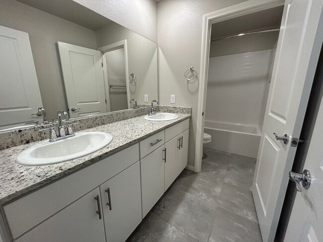 Building Photo - Gorgeous two-story home with 5 bedrooms and 3 bathrooms in a gated community