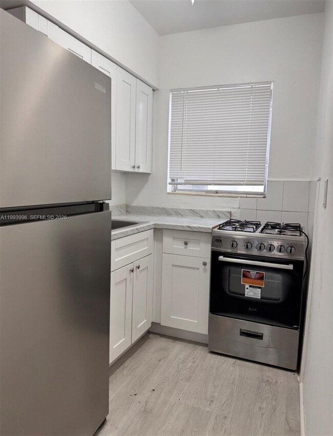 Building Photo - 7717 Byron Ave