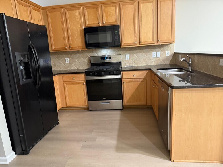 Kitchen with new flooring - 1022 Firethorne Pass