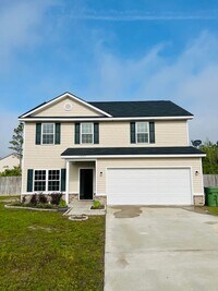 Building Photo - Pet Friendly 2 Story 4 bed 2 1/2 Bath home.