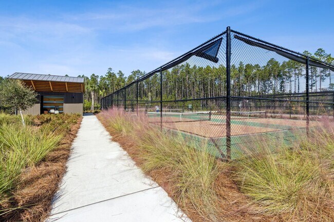 Building Photo - Discover the Ideal 55+ Lifestyle in Your N...