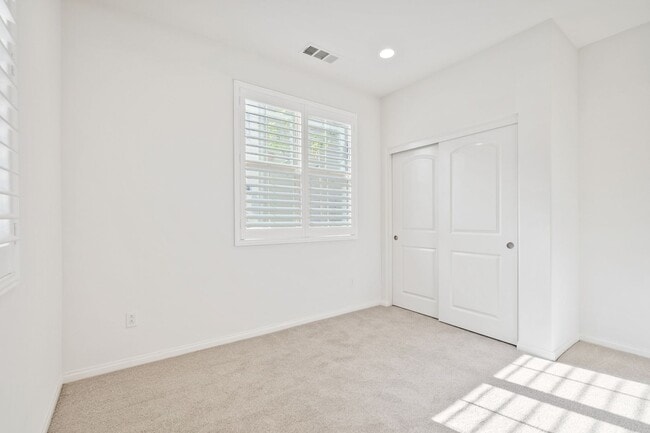 Building Photo - Beautiful newly built 4 bedroom, 3 bath home in the quiet, gated community of Westgate!