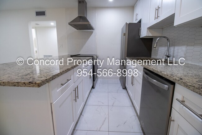 Building Photo - Updated 2 BR- Open Layout- Island Kitchen-Pool- Central AC