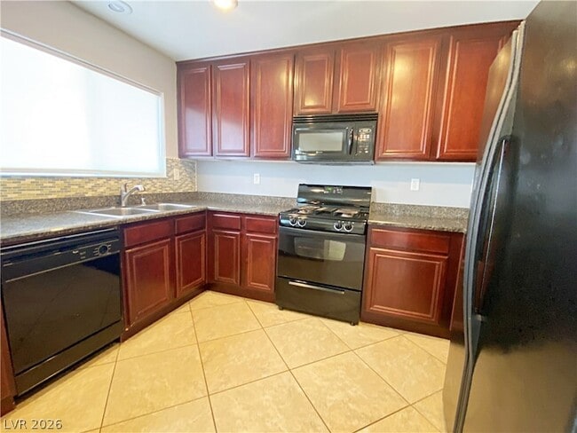 Building Photo - 6496 Robusta Ct