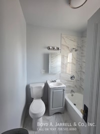 Building Photo - 10855 S Vernon Ave