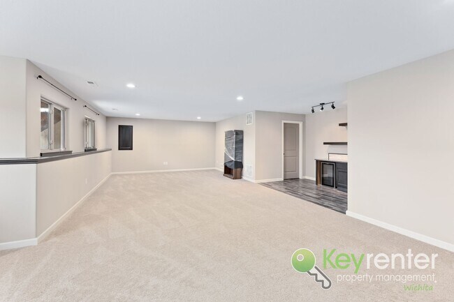 Building Photo - Spacious 4-Bedroom Home with Finished Basement & 3-Car Garage – Derby, KS