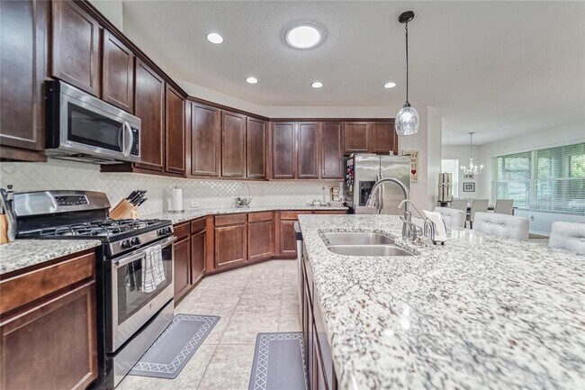 Building Photo - 6906 Covington Stone Ave