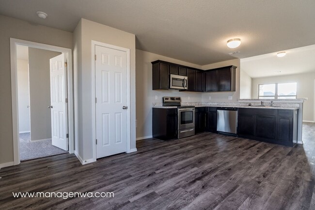 Building Photo - Cozy 4 Bedroom Elkins Home! Lots of upgrades!!