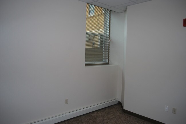 Building Photo - Essential Living - market rate apartments