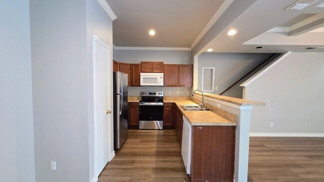 Building Photo - The Gardens at Summit Townhome: 3 Bedroom * 1-car Garage * WD Connections