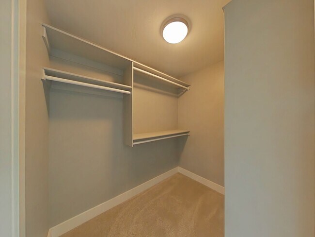 Building Photo - Stunning 3-bedroom, 2.5-bathroom condo with attached 2 stall garage!