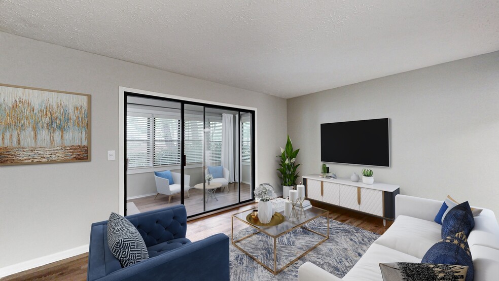 Newly Renovated Living Room with Sunroom - Rosemont at East Cobb Apartments