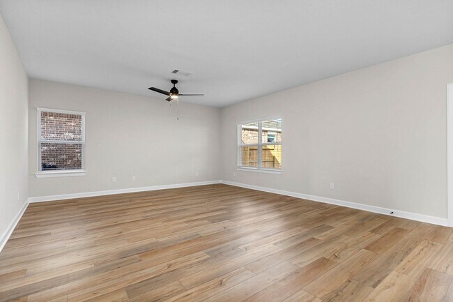 Building Photo - 1006 Whispering Winds Dr