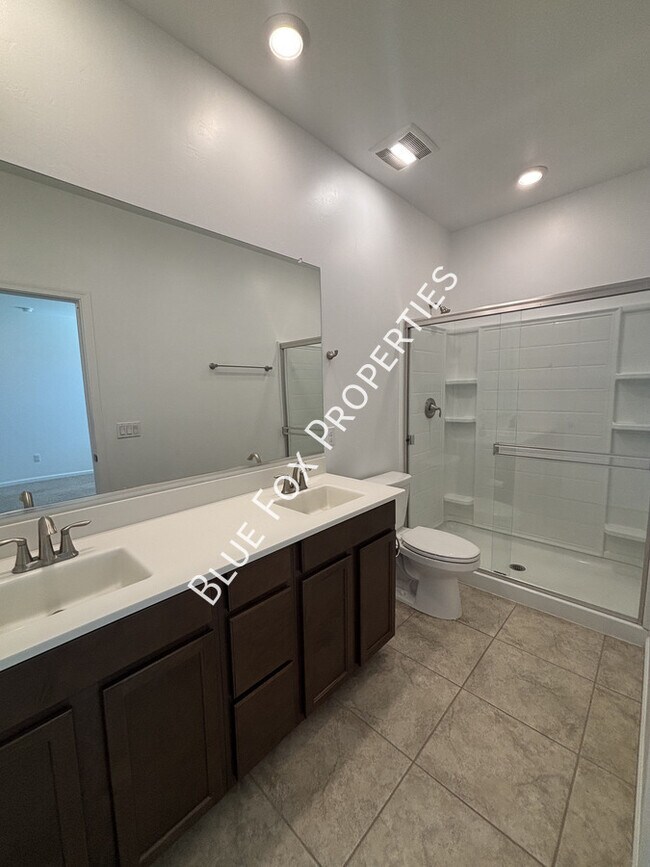 Building Photo - 7095 W Jadewood Ln