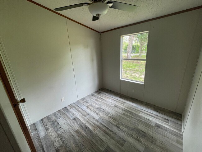 Building Photo - Looking for Acreage? This updated 3 bed, 2 bath home with an inside laundry room sits on 1.5 Acre...