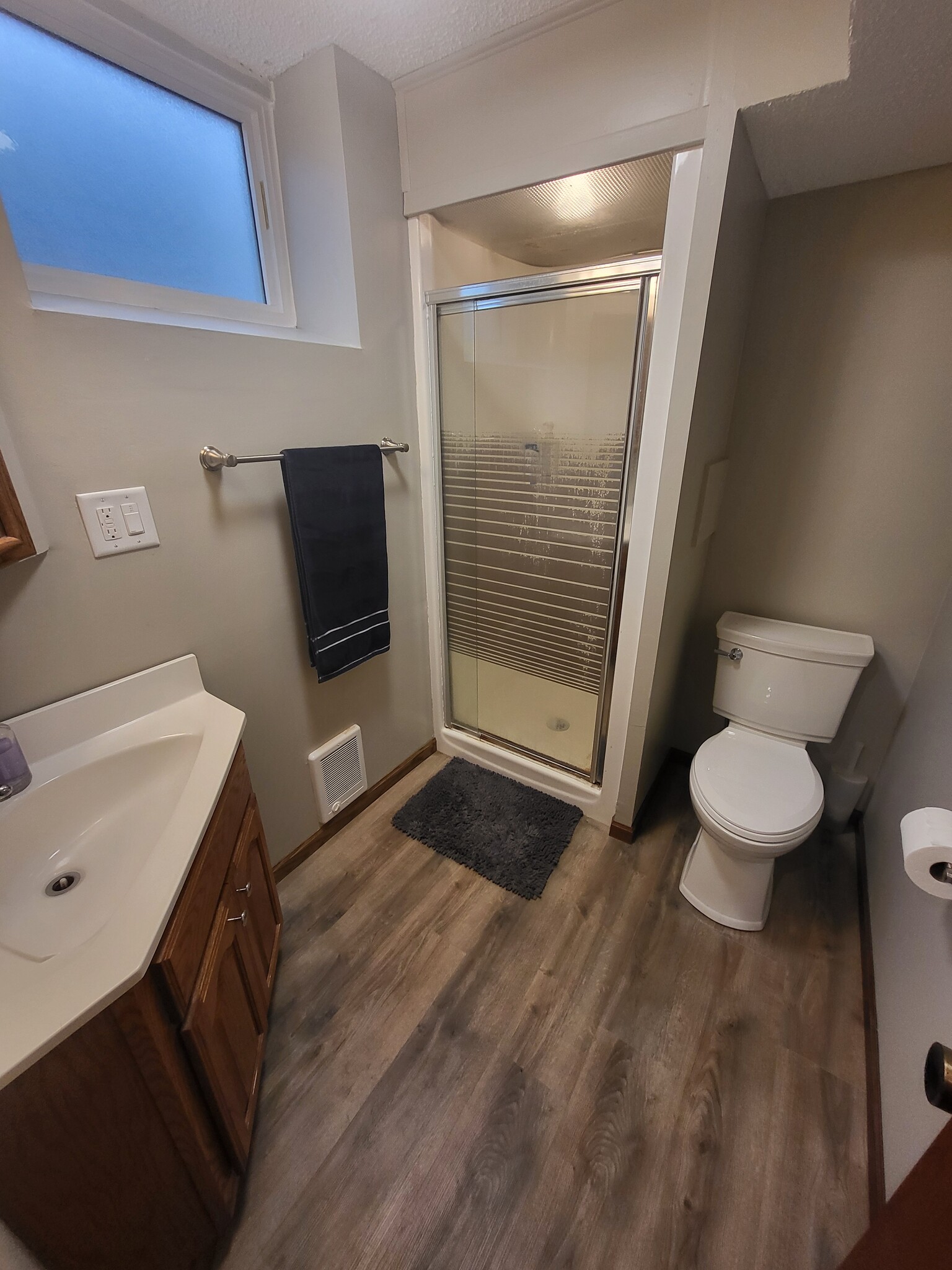 3/4 bathroom in the lower level - 8460 Red Oak Dr