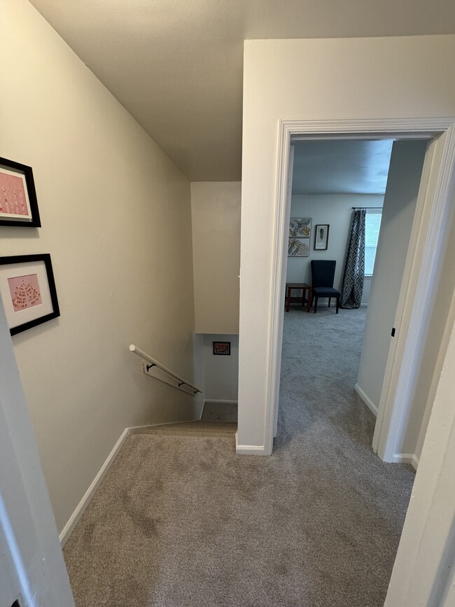 Queen bedroom and stairwell - 4591 Ayers Rd