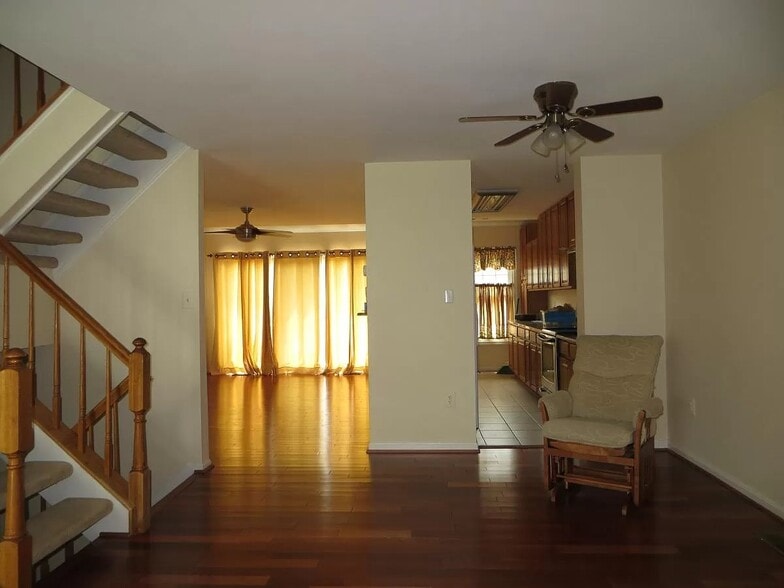 MMAIN: From the Living Room looking into Kitchen/Dining areas. - 7039 Chesley Search Way