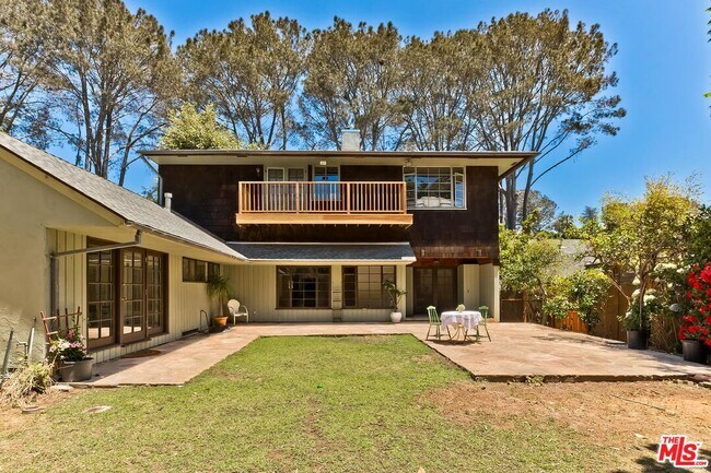 Building Photo - 515 N Kenter Ave