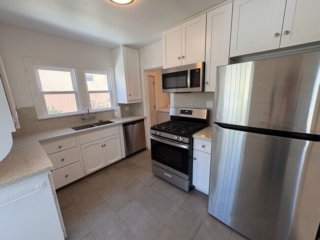 Building Photo - Charming Tudor Style 3 Bed 1.5 Bath PLUS Studio Guest House complete with kitchen and bath!