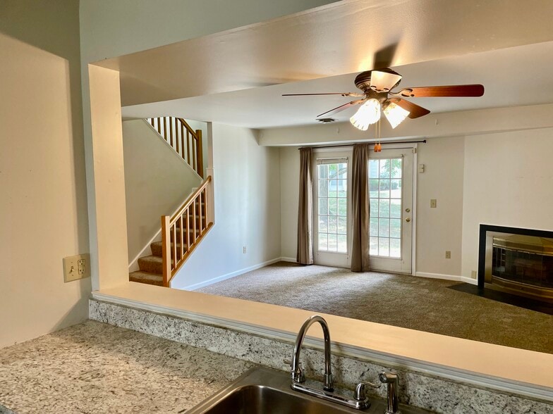 View from kitchen into living room - 1002 Cambridge Ct
