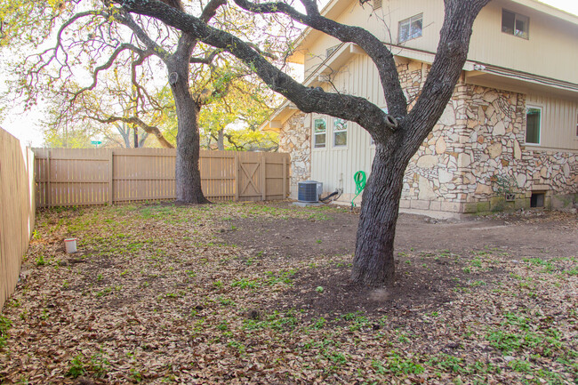 Massive backyard with beautiful trees that provide great shade in the summer. - 100 Beaver St