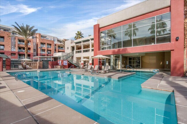 Building Photo - Top level 2 bedroom condo located in guard...
