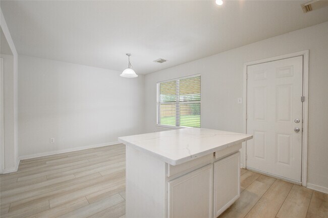 Building Photo - 8542 Village Rose Ln