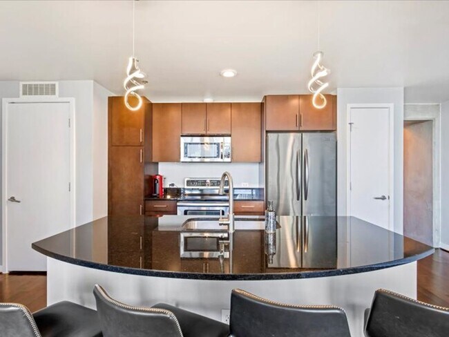 Building Photo - Luxury High Rise Condo Available 7/1/25