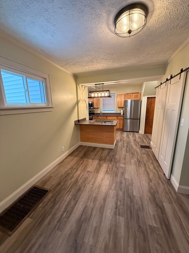 Building Photo - 3 Bedroom 2 1/2 Bathroom with one car detached garage