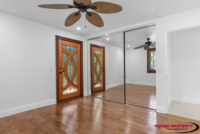 Building Photo - Spacious 5-Bedroom Home with Modern Amenit...