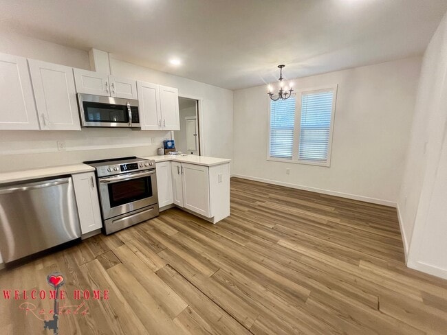 Building Photo - 4 bedroom home with air conditioning - Great location!!!  HUGE basement for your man cave or she ...