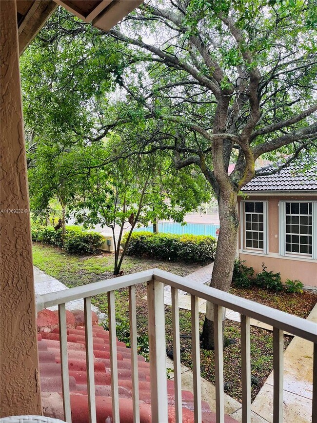 Building Photo - 3221 Sabal Palm Manor